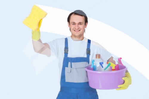 Carpet cleaner preparing equipment before a safe cleaning job
