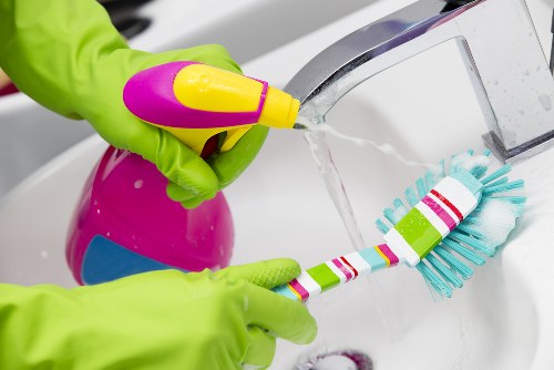 Local cleaner carrying out a deep clean in a Lambeth property