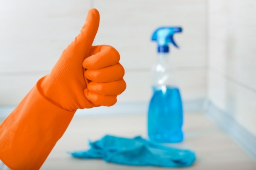 Local cleaner carrying out regular property maintenance in Lambeth